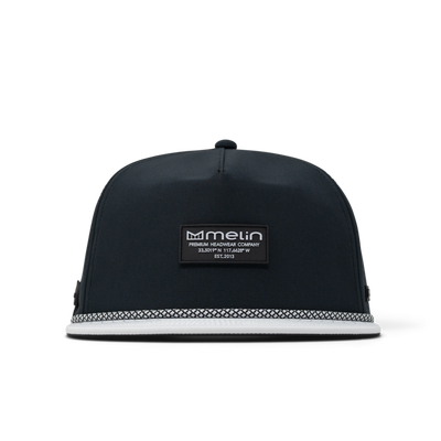 Close-up of Hydro Coronado Brick Black Hat showing Black cap with woven checkerboard pattern trim and white rope banding on