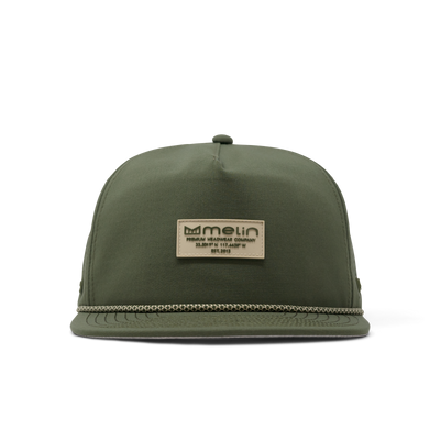 Close-up of Hydro Coronado Brick Black Hat showing Cream rectangular label with embossed logo and coordinates centered on