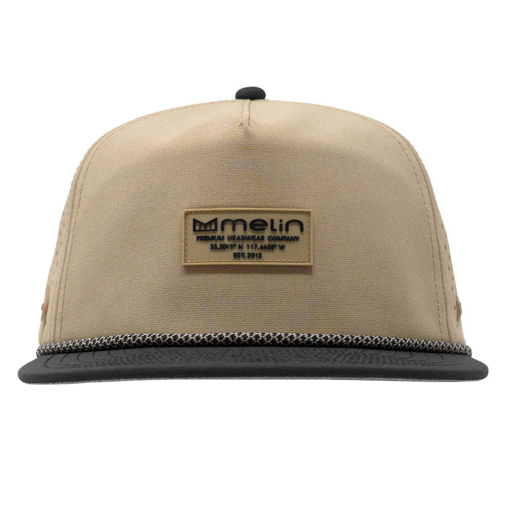 Close-up of Hydro Coronado Brick Black Hat showing Tan canvas crown with black visor and rope trim, tan leather patch label