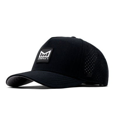 Close-up of Hydro Odyssey Stacked Black Camo Hat showing Black mesh trucker cap with perforated side panels and woven brand