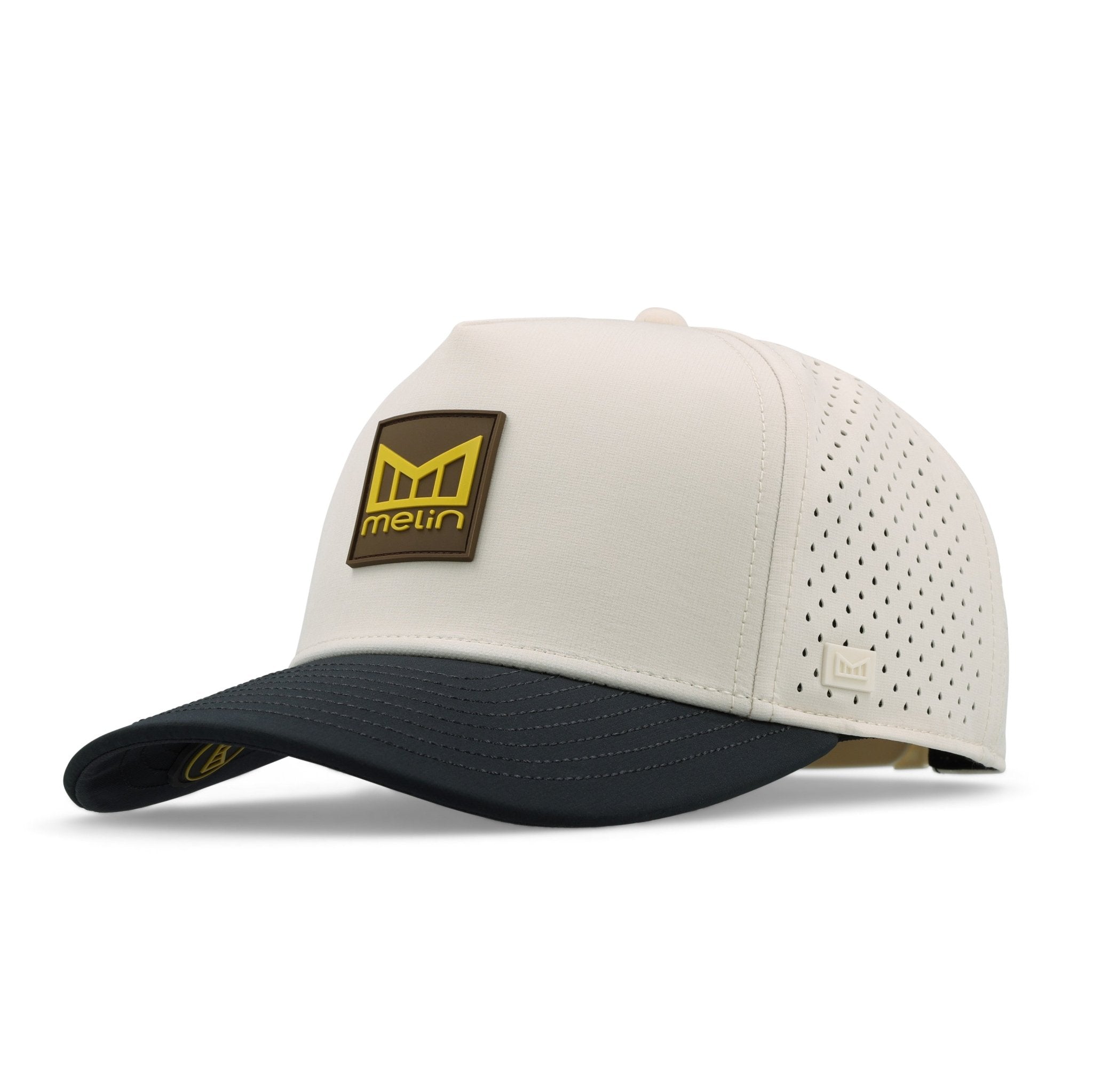 Close-up of Hydro Odyssey Stacked Black Camo Hat showing Cream crown with perforated mesh panels, black bill, brown and