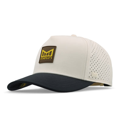 Close-up of Hydro Odyssey Stacked Black Camo Hat showing Cream crown with perforated mesh panels, black bill, brown and