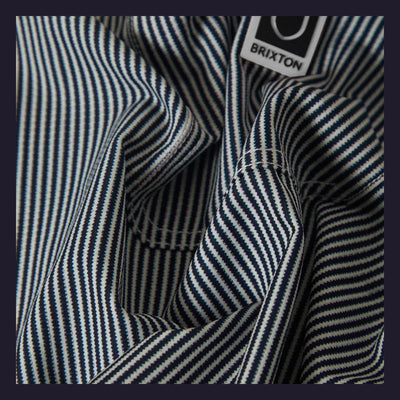 Close-up of Journey LW SS Woven Navy/white Stripe S/S Woven S/S Woven showing Navy and white vertical stripe weave with