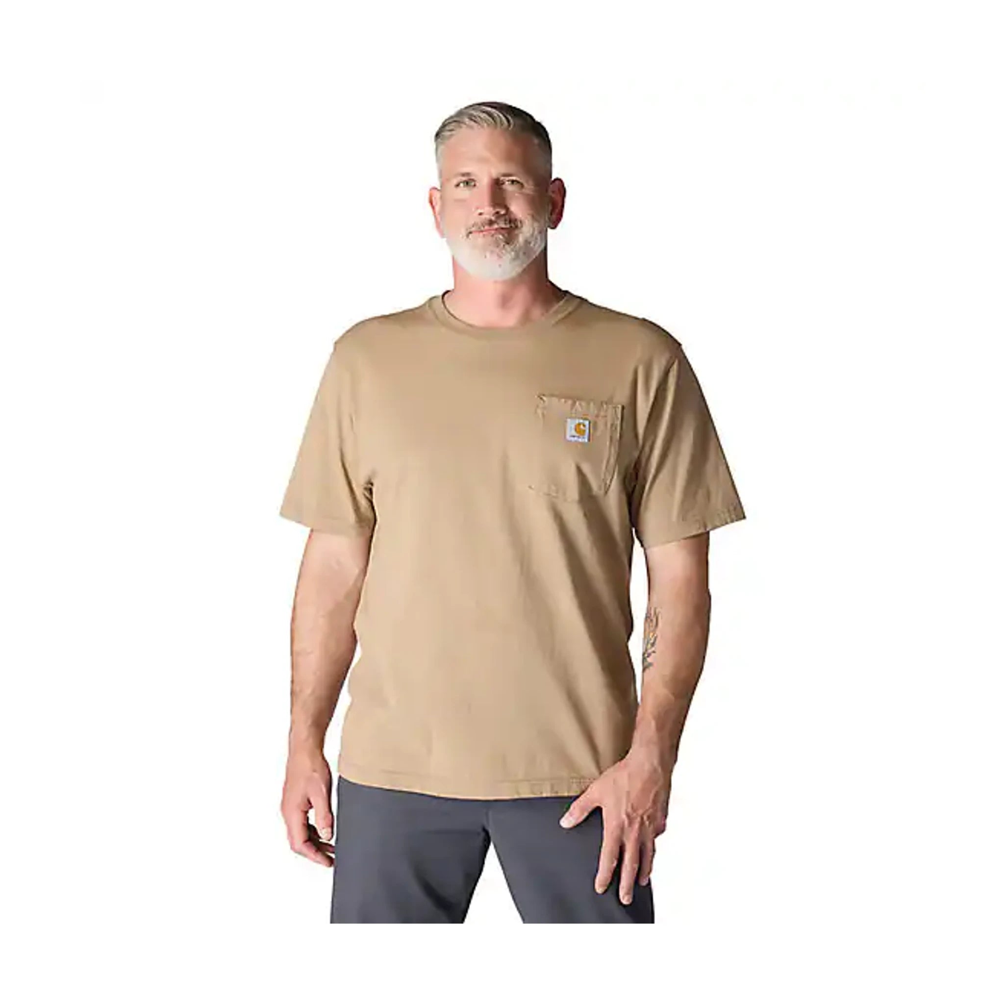 Person wearing K87 (reg) Black Tee, Man wearing tan t-shirt against plain white studio background - Slowride Supply