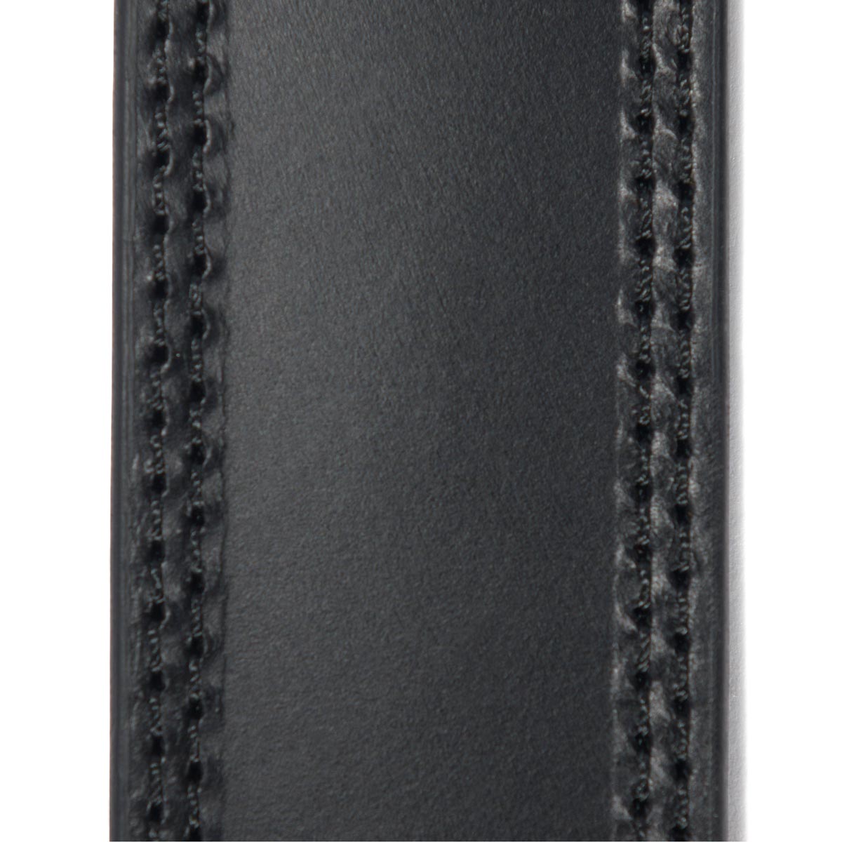 Close-up of Leather Engraved Buckle Belt Accessory Brown Accessory showing Contrast topstitching along both side seams of