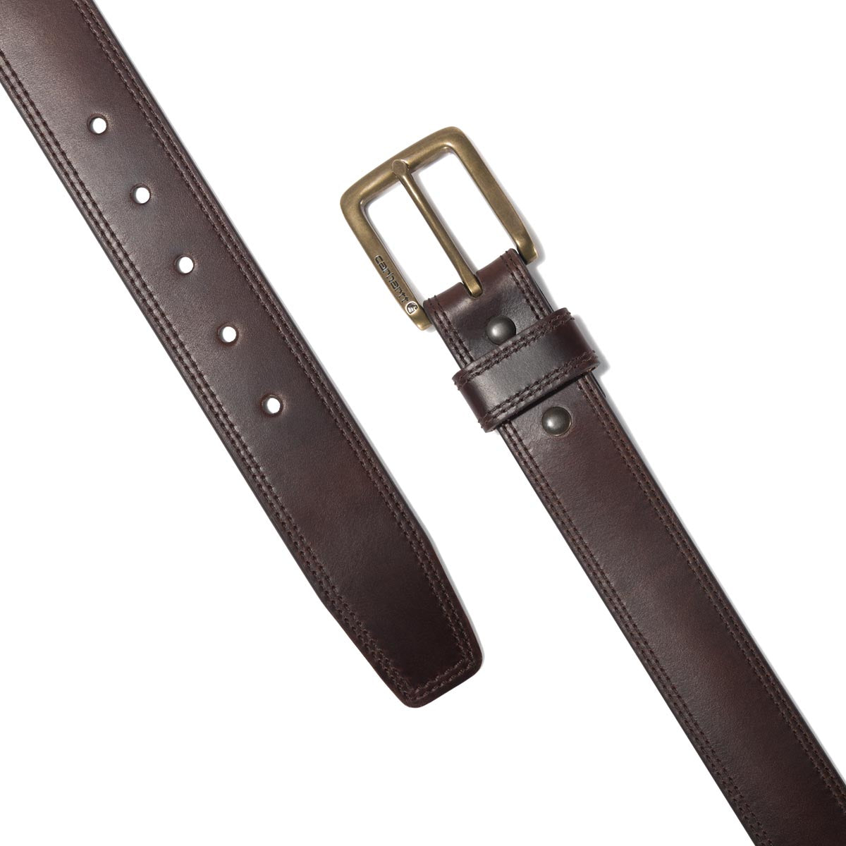 Close-up of Leather Engraved Buckle Belt Accessory Brown Accessory showing Brown leather belt with brass rectangular buckle