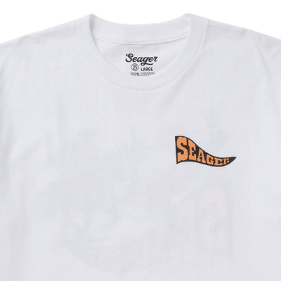 Close-up of Long Ride White Tee showing White cotton tee with small orange and black curved banner graphic on chest -