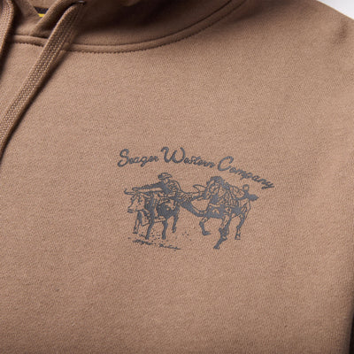 Close-up of Los Rios Black Hoodie showing Embroidered script text and motorcycle racer graphic in blue on tan fabric -