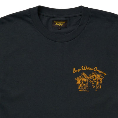 Close-up of Los Rios Vintage Black Tee showing Crew neck collar tag with gold script branding and size L marking visible -