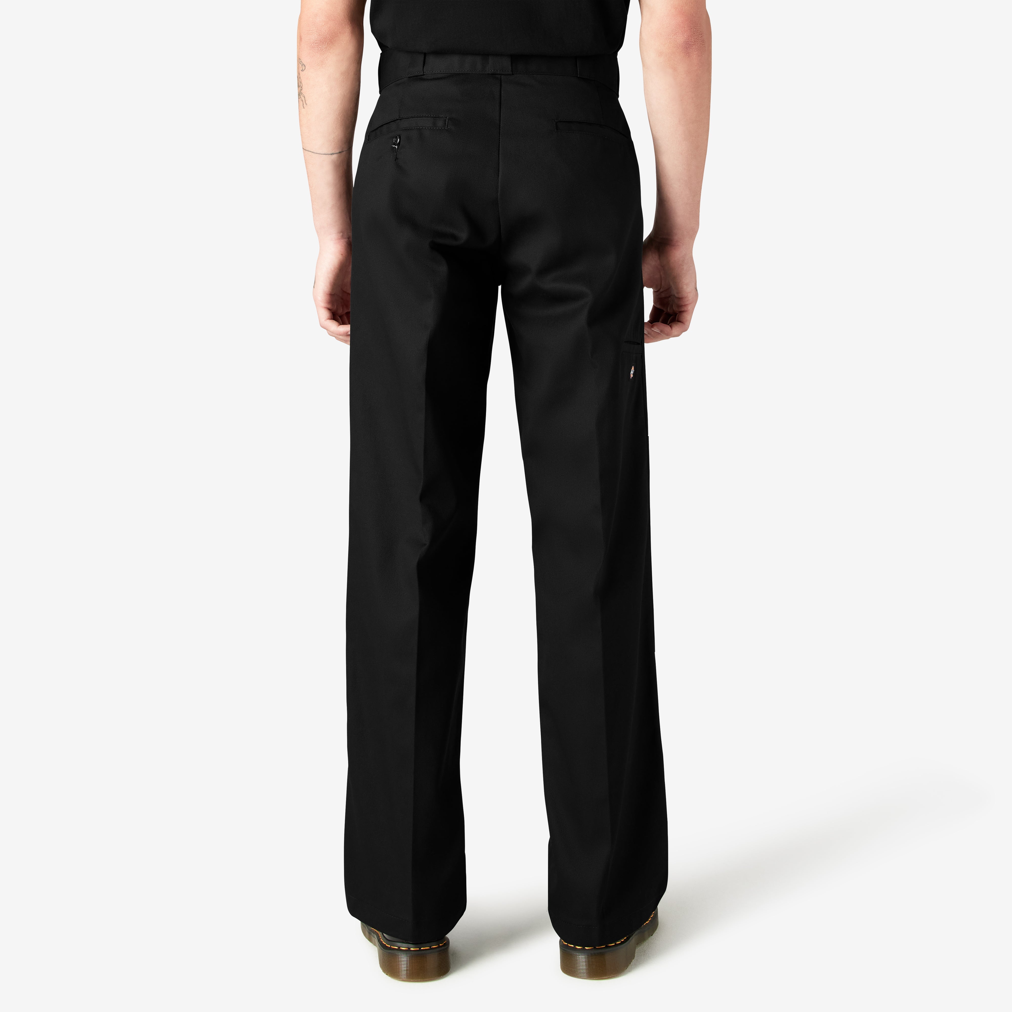 Person wearing Mens Twill Double Knee Work Pant (85283) Pants Dark Brown Pants, Man standing against neutral white