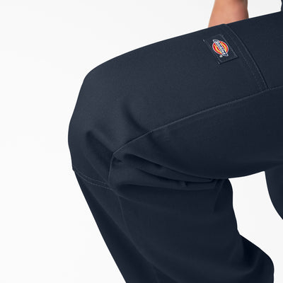 Person wearing Mens Twill Double Knee Work Pant (85283) Pants Dark Brown Pants, Neutral studio setting with plain white