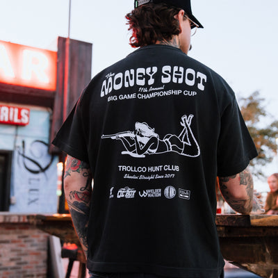 Back of Money Shot Heavyweight Tee, Black with white text reading "The Money Shot 11th Annual Big Game Championship Cup"
