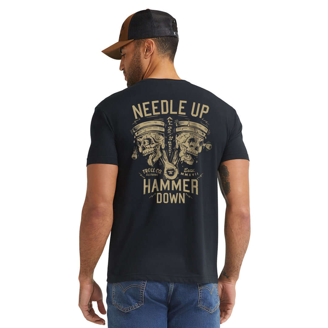 Person wearing NUHD Hammer Twins Black Tee, Man wearing black tee standing against neutral white backdrop - Slowride Supply