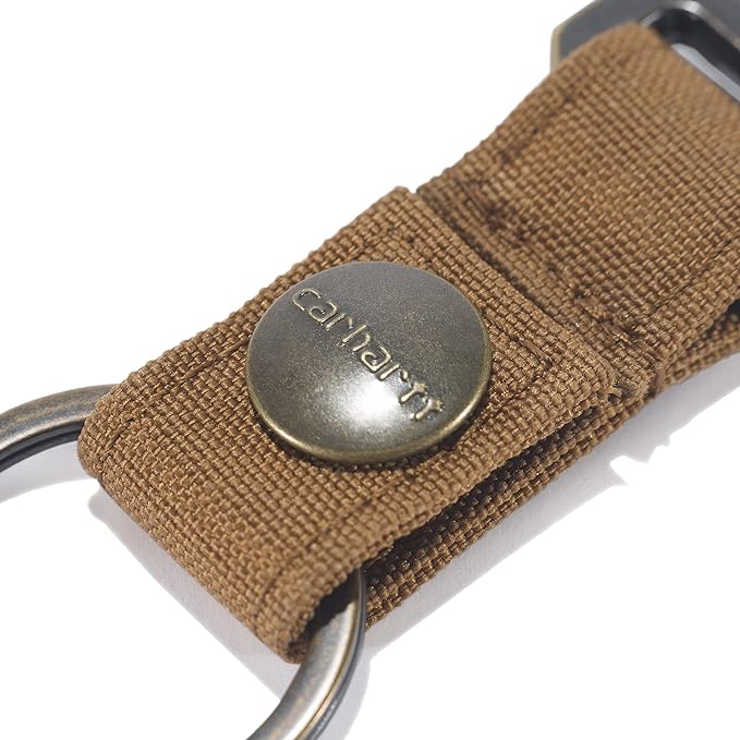 Close-up of Nylon Duck Key Keeper Accessory Grey Accessory showing Tan canvas strap with metal snap button and embossed