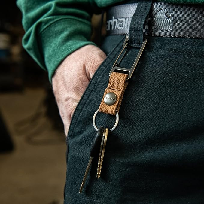 Person wearing Nylon Duck Key Keeper Accessory Grey Accessory, Person wearing green sleeve and dark denim in workshop or
