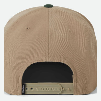 Close-up of Oath III Snapback Khaki/primal Green Hat showing Tan cotton twill crown with forest green button detail and