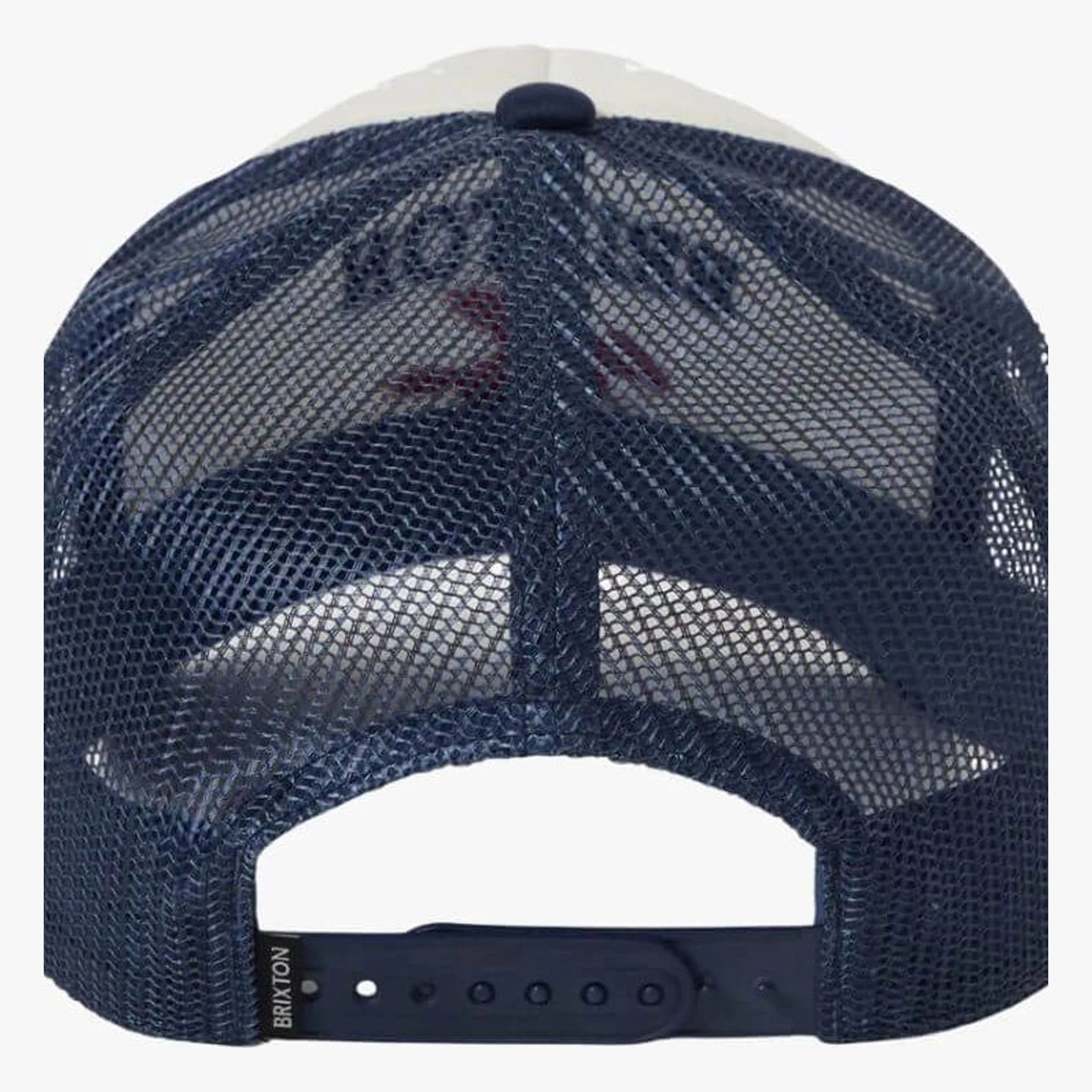 Back of Pegasus NP MP Trucker Apparel White Cap/Navy Apparel, Navy mesh back with cream foam front panels and navy snap