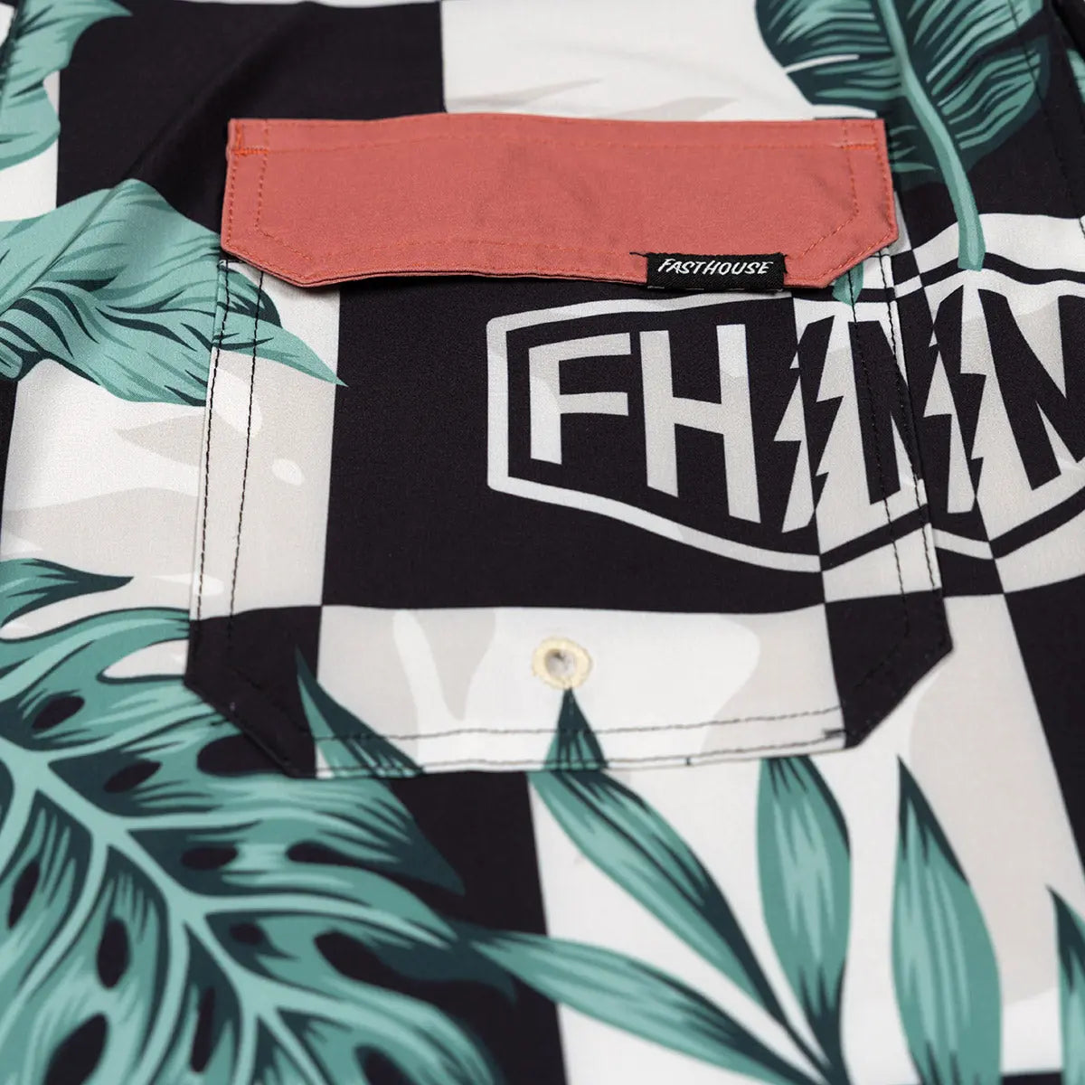 Close-up of Poolside 19" Boardshort Apparel Black/Off White Apparel showing Coral waistband with black brand label and