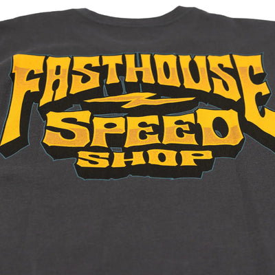 Close-up of Record Natural Tee showing Printed graphic detail showing yellow and black speedshop logo with outlined border