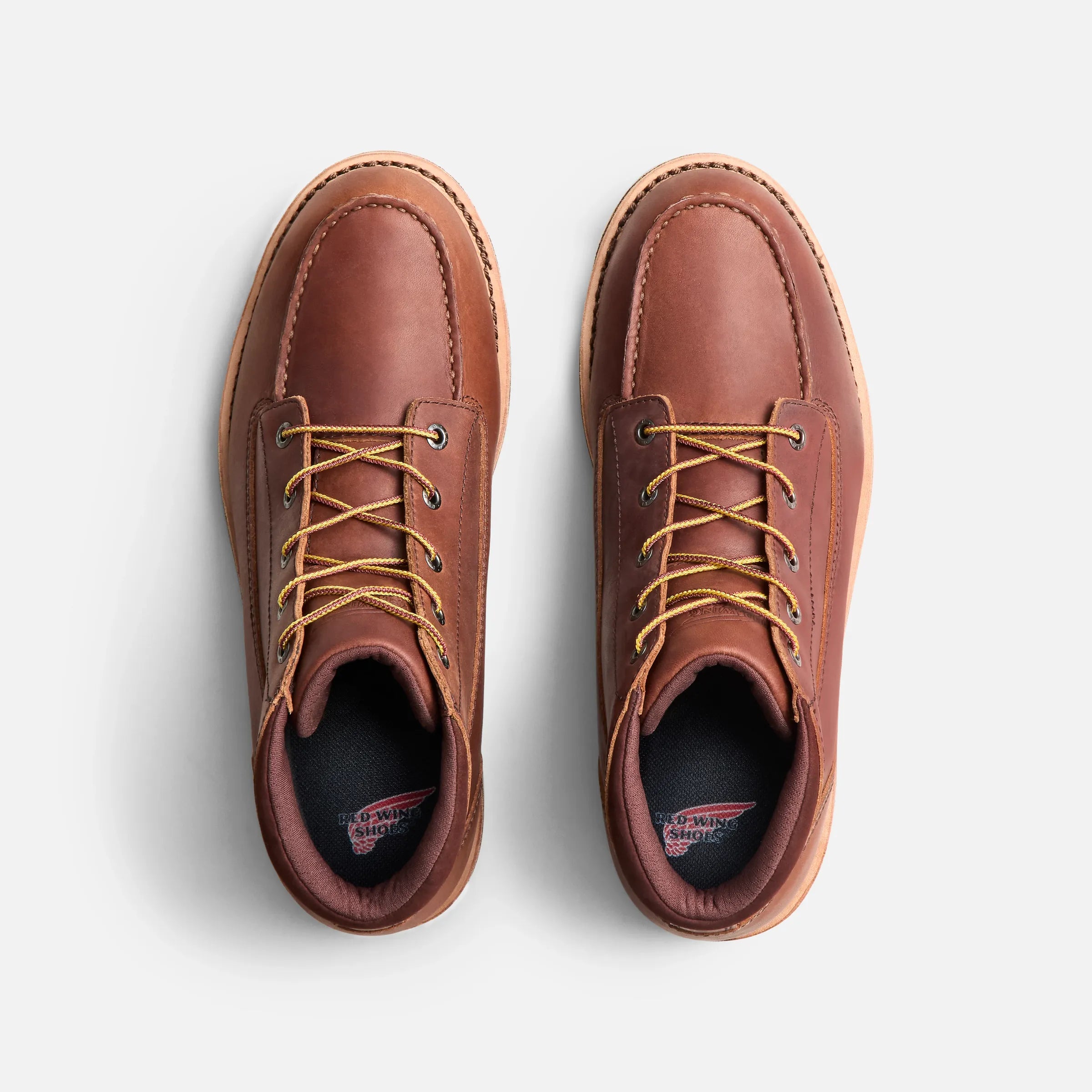 Back of 1221- Traction Tred Lite Boots Boots, Black insole with red wing logo and text visible inside boot opening -