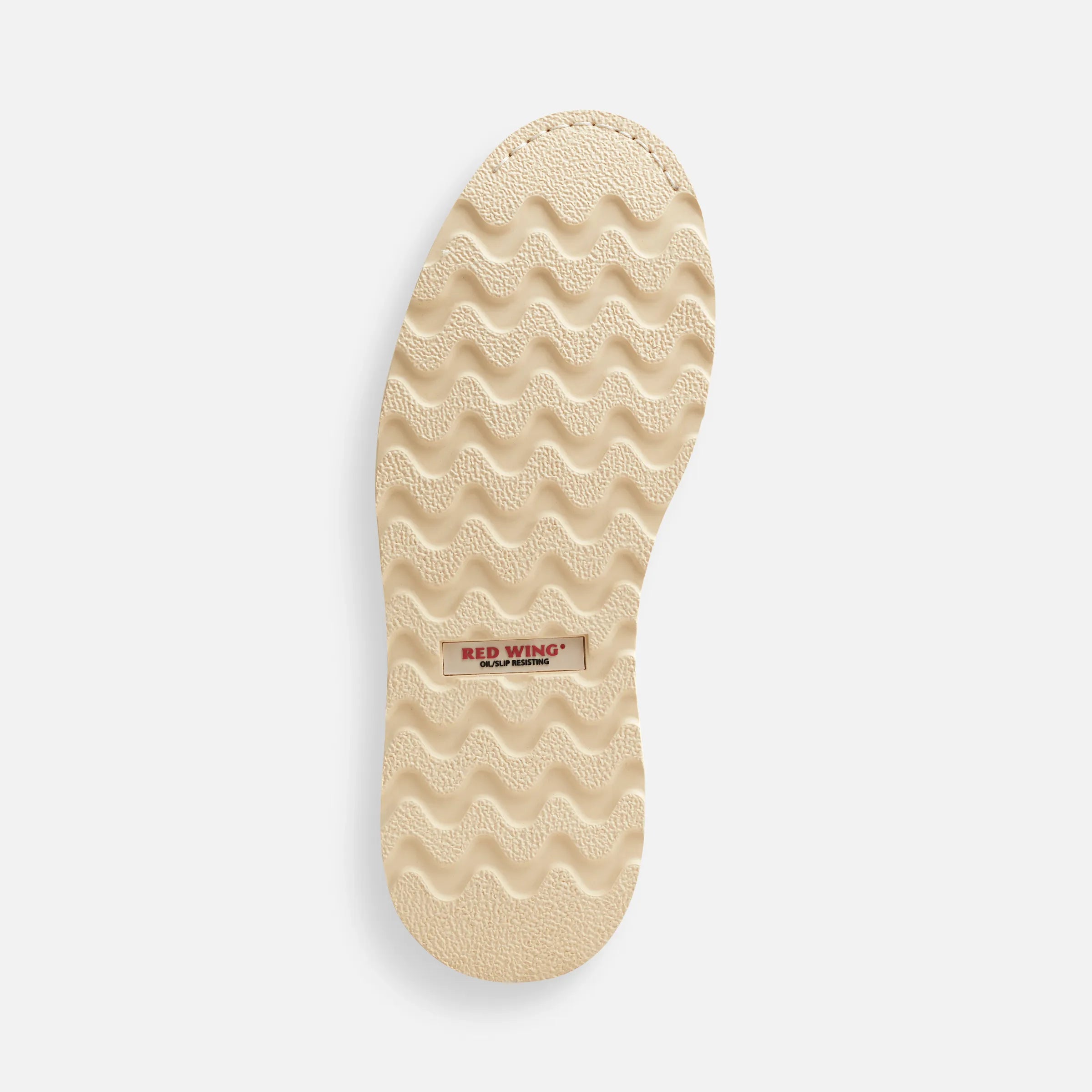 Close-up of 2415- Traction Tred Boots Boots showing Cream sole with wavy tread pattern and oil slip resistant label -