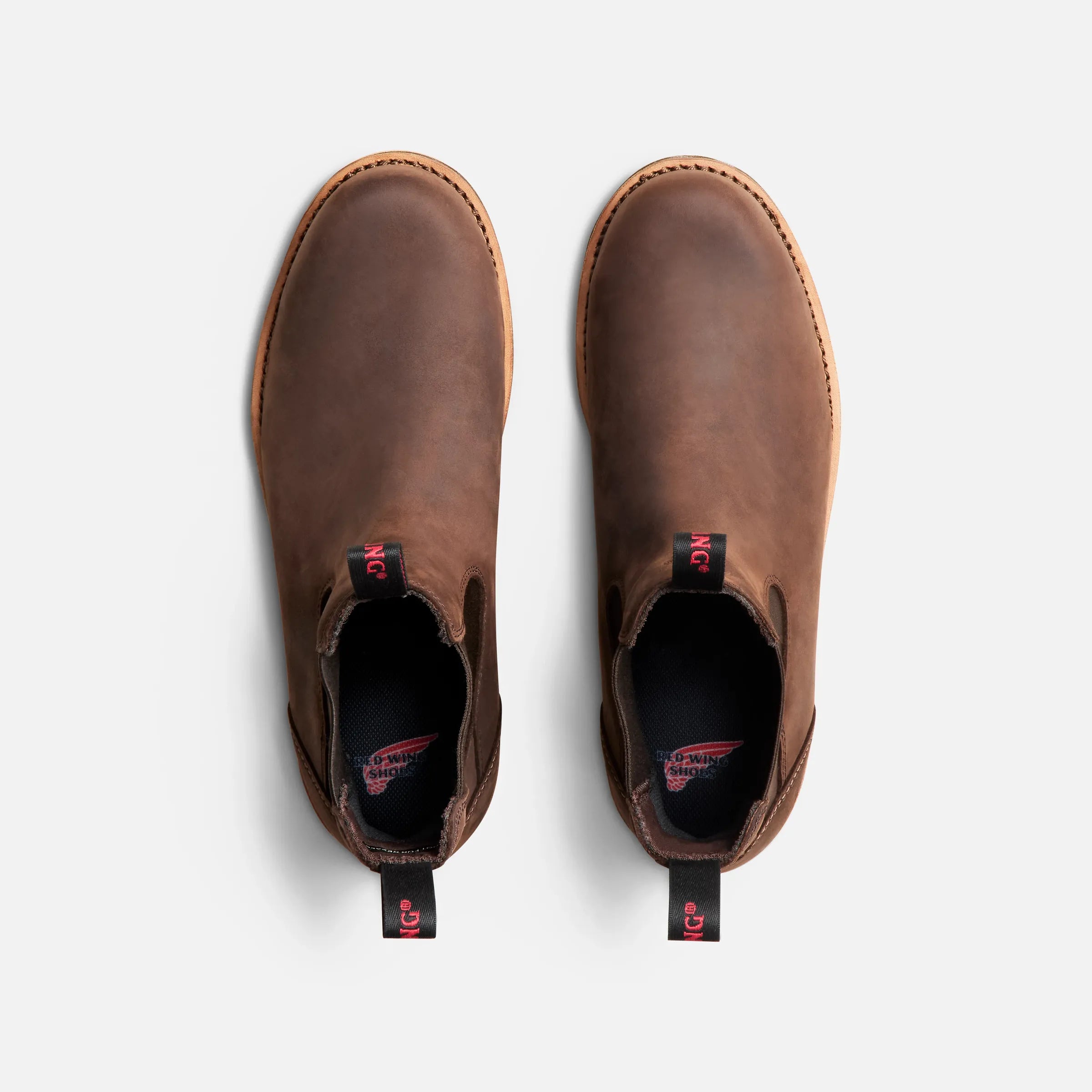 Back of 2446- Traction Tred Lite Boots Boots, Black pull tab with red logo at heel, black neoprene lining visible inside