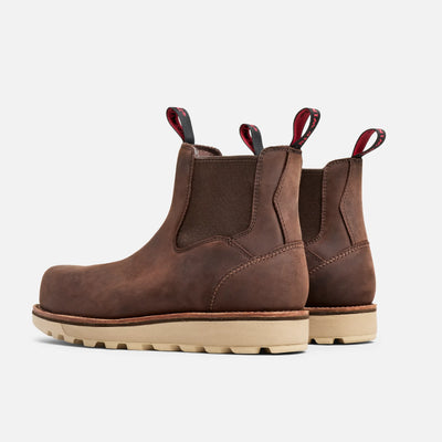 Close-up of 2446- Traction Tred Lite Boots Boots showing Brown nubuck chelsea boot with cream lug sole and red pull tabs -