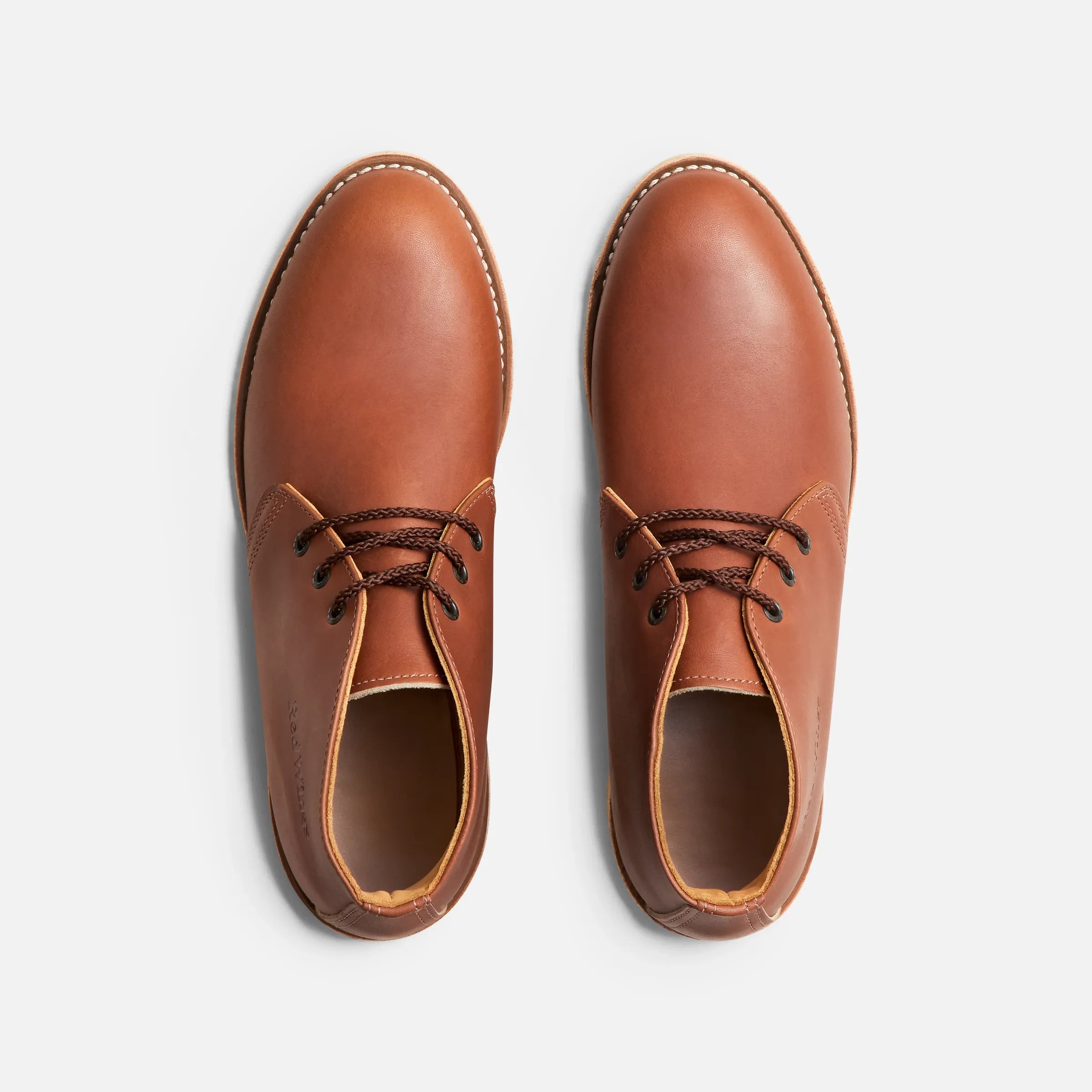 Back of 595- Traction Tred Chukka Boots Boots, Smooth tan leather heel with contrasting cream stitching and dark laces -
