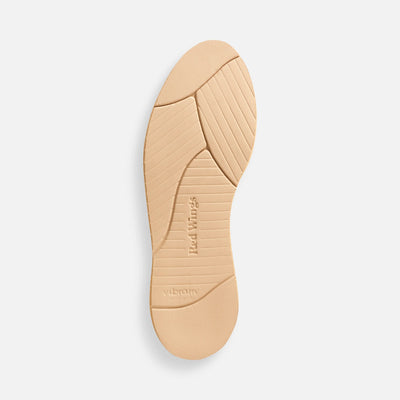 Close-up of 595- Traction Tred Chukka Boots Boots showing Tan rubber sole with linear tread pattern and Vibram branding -