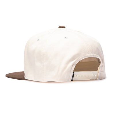 Close-up of Rhett MP Snapback Off White/pinecone Brown Hat showing White canvas crown with brown suede visor and snapback