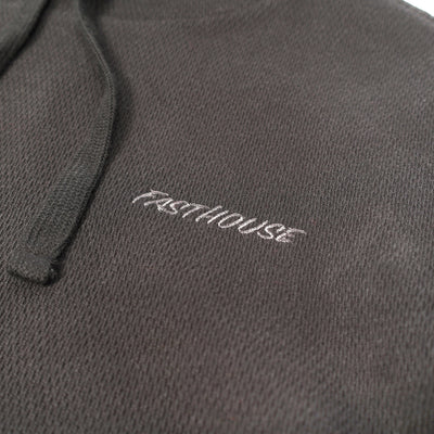 Close-up of Robin Hooded Thermal Apparel Black Apparel showing White embroidered script text on charcoal ribbed knit fabric