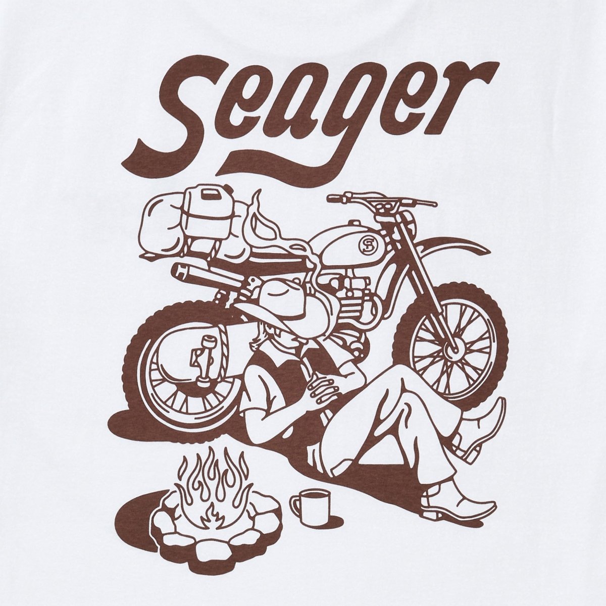 Close-up of Romero White Tee showing Brown italic serif lettering and line-art motorcycle graphic with campfire scene detail
