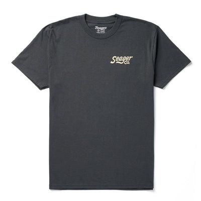 Close-up of Romero White Tee showing Charcoal crew neck tee with small cream script logo on left chest area - Slowride Supply