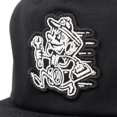 Back of Runner Hat Apparel Black Apparel, White embroidered mechanic character holding wrench with text on black cap back -