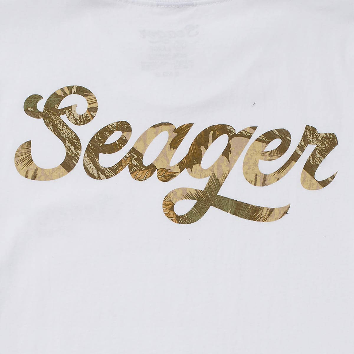 Close-up of Russ Fill Black Tee showing Gold foil texture fill within cursive lettering on white fabric - Slowride Supply