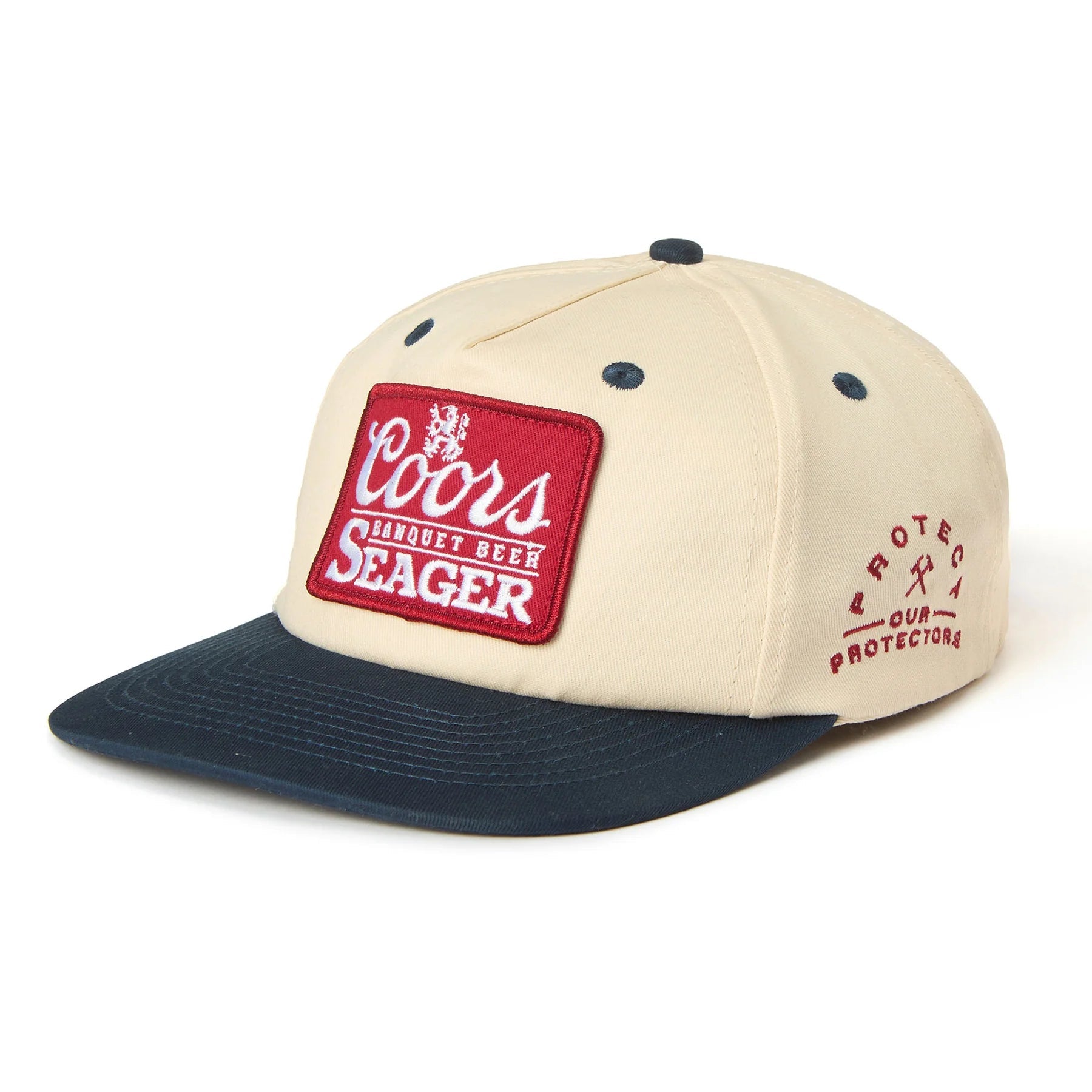 Back of X Coors Banquet P.o.p. Snapback Cream/navy-cream/navy Hat, Cream back panel with red embroidered text and crossed