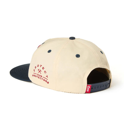 Close-up of X Coors Banquet P.o.p. Snapback Cream/navy-cream/navy Hat showing Cream crown with navy blue eyelets and navy