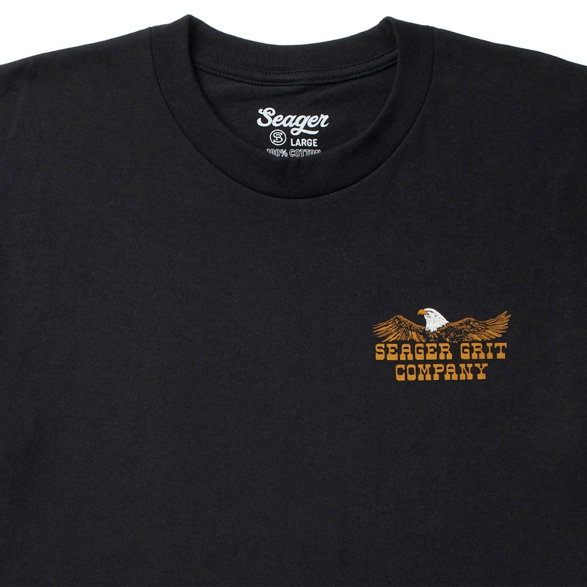 Close-up of SGR Big Rig Black Tee showing Crew neckline with ribbed binding and interior neck label reading size and fiber