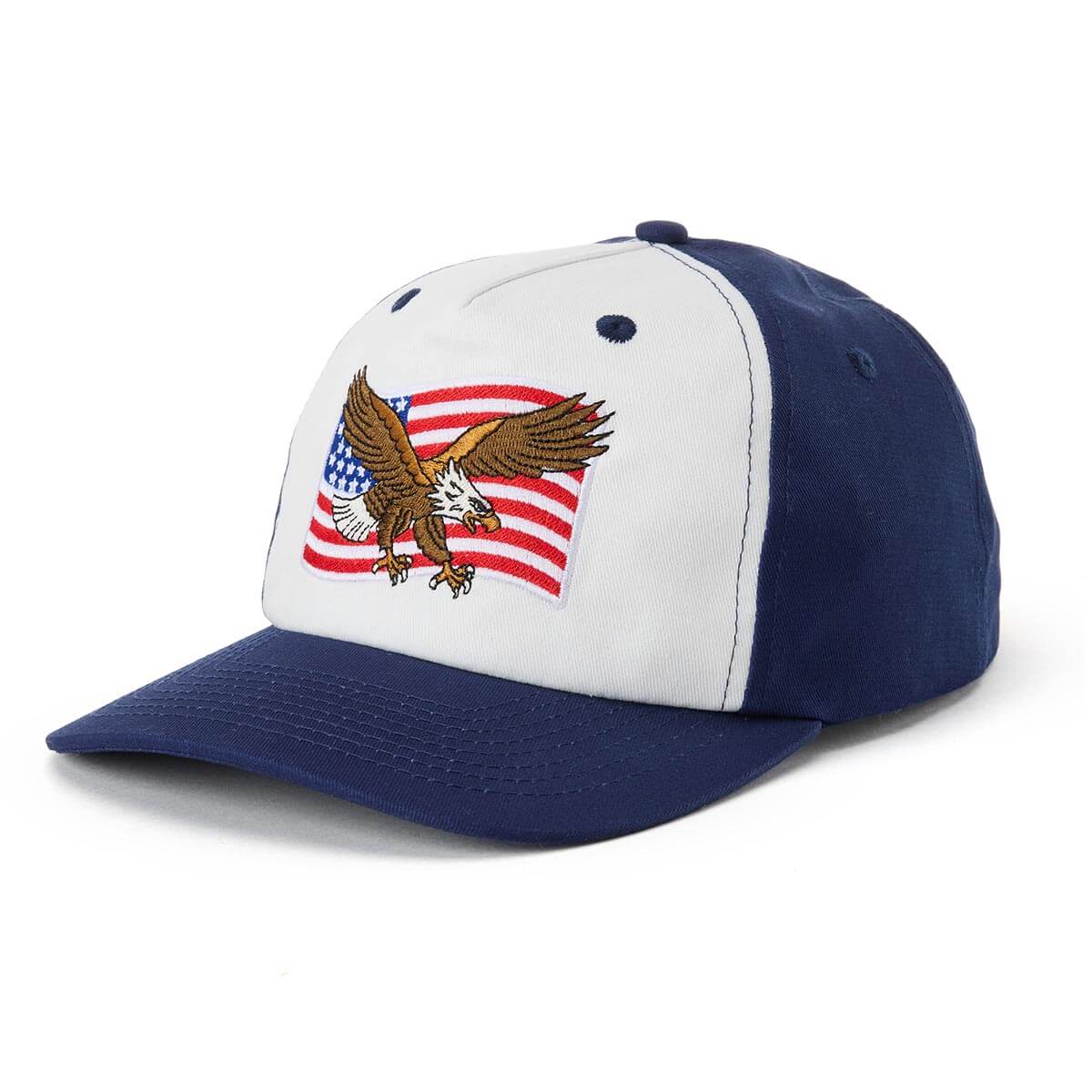 Close-up of SGR USA Snapback Camo Hat showing Navy and white two-tone cap with embroidered eagle and American flag graphic