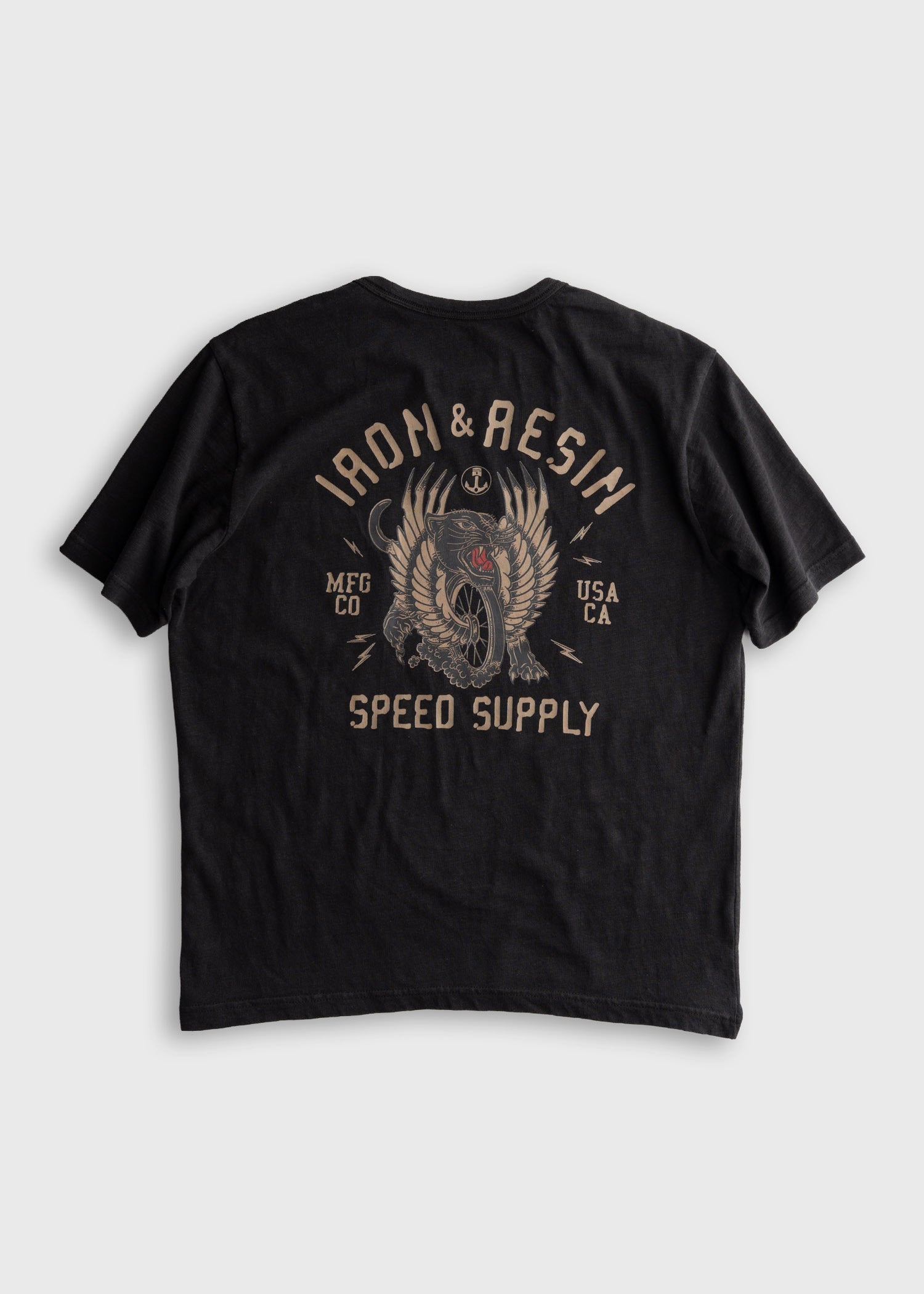 Speed Supply front view, Black with tan winged motorcycle graphic and "Iron & Resin Speed Supply" text, MFG CO and USA CA