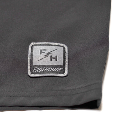 Close-up of Stealth 21" Boardshort Boardshorts Black Boardshorts showing Embroidered rectangular patch with FH lightning