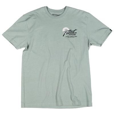 Close-up of Sunset Black Tee showing Sage green with black script logo and phone number beneath circular moon graphic on
