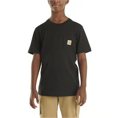 Person wearing Tk6513 Short Sleeve Pocket Tee Kids Brown Kids Tee, Boy wearing black tee with small chest patch standing