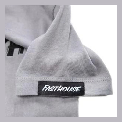 Close-up of Toddler Fray Tee Kids Light Gray Kids Tee showing Black woven label with white italic script on light gray