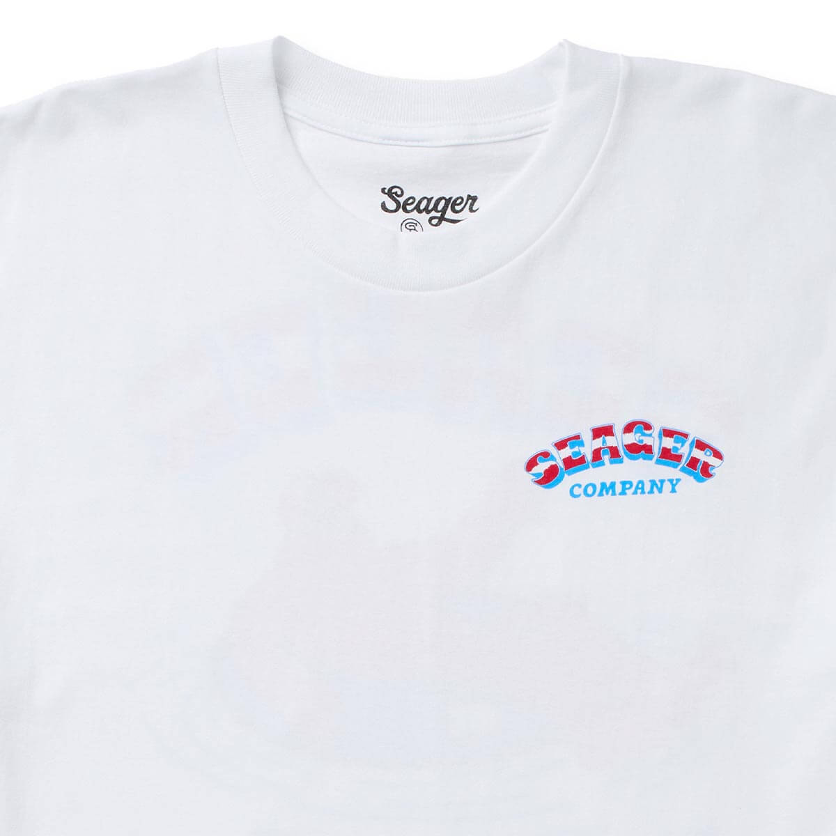 Close-up of Tubular White Tee showing Ribbed crew neckline with interior neck tag, small chest embroidery in red and blue