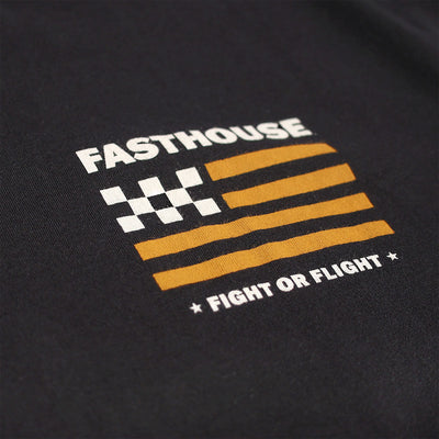 Close-up of Unite Embroidered graphic with white "FASTHOUSE" text, checkered flag pattern, gold horizontal stripes, and