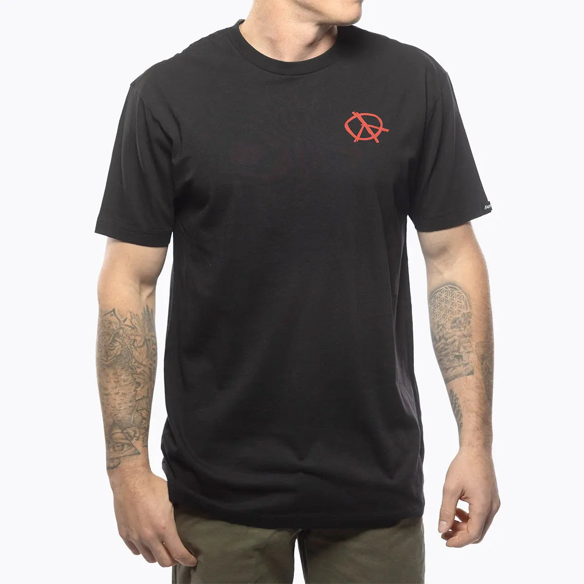 Person wearing Utopia Black Tee, Man wearing black tee standing against plain white backdrop - Slowride Supply