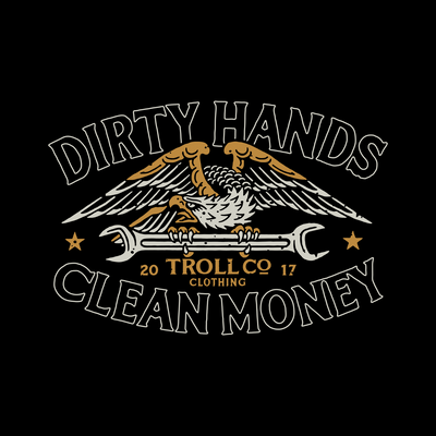 Close-up of Wing Spanner Black Tee showing Black with cream and gold eagle holding wrench, "Dirty Hands Clean Money" text