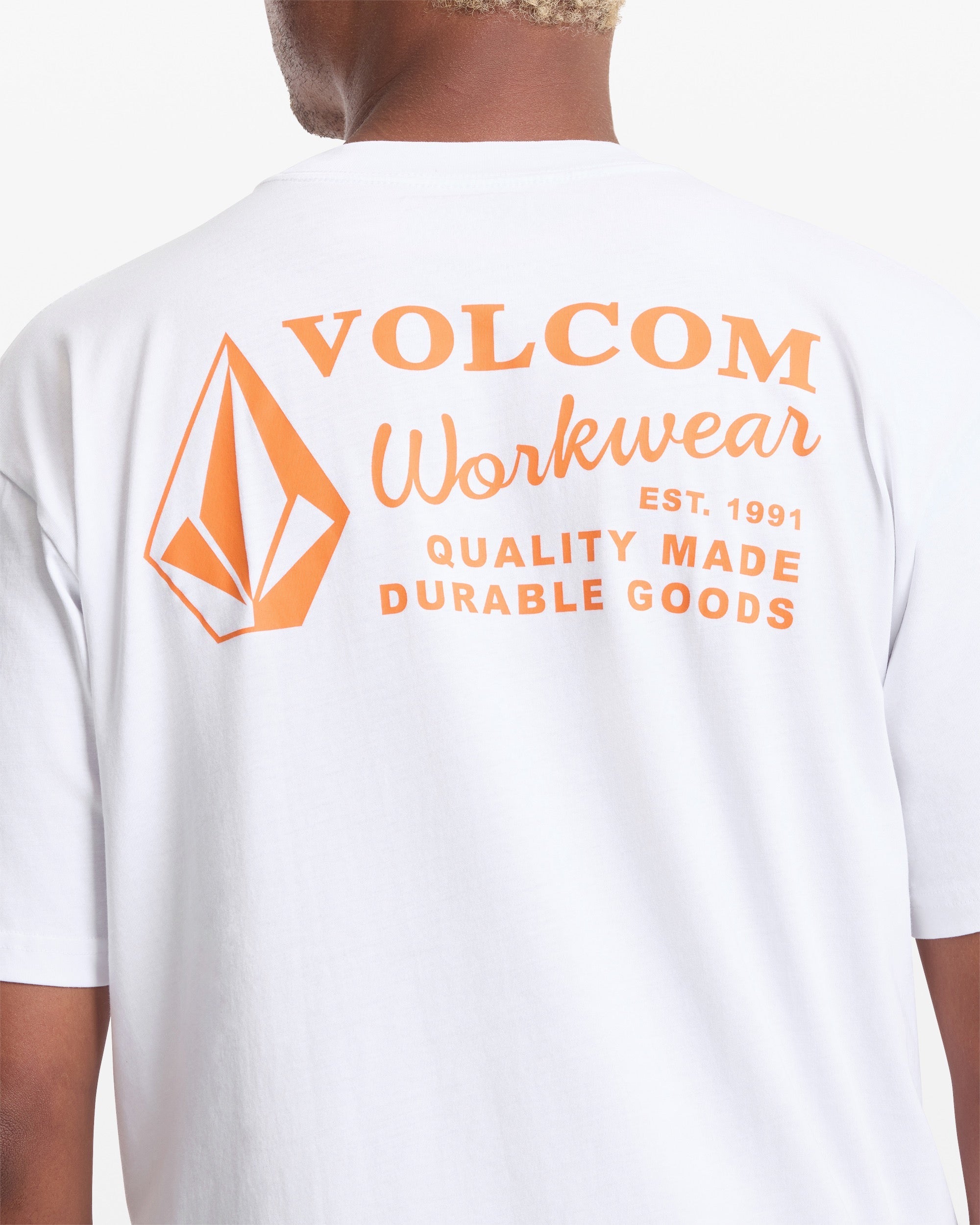 Workwear front view, White with orange geometric logo and text reading "Workwear EST. 1991 Quality Made Durable Goods, White