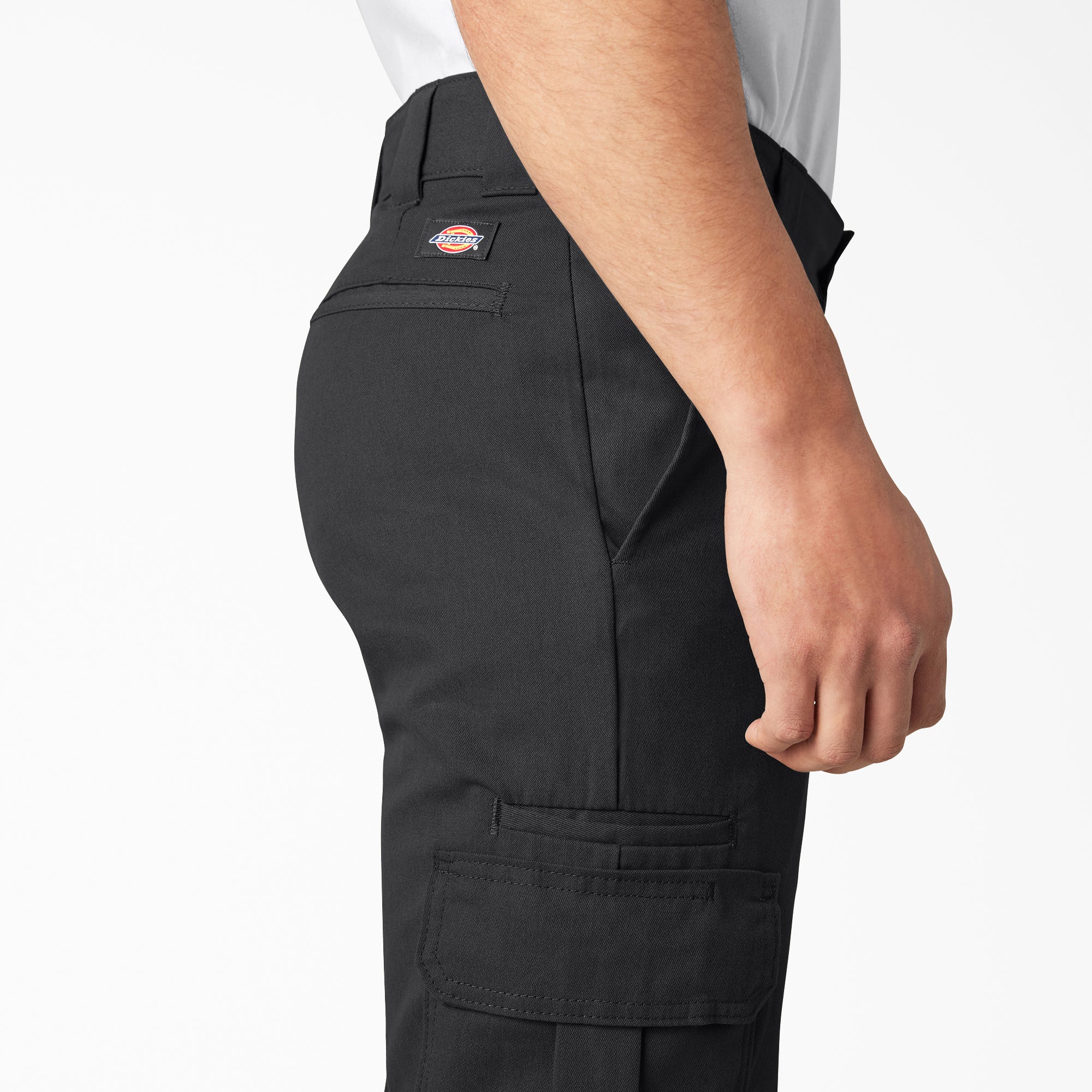 Person wearing Wp595 Cargo Pant Regular Fit Pants Black Pants, Man wearing black cargo pants with white shirt against plain